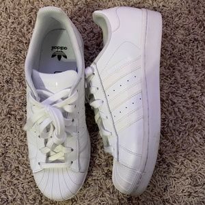 White Adidas Superstars